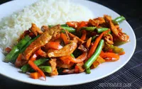 Stir fry chicken with a side dish