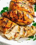 Grilled chicken breast with a side dish