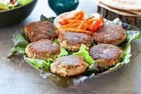 MUTTON SHAMI KABAB WITH GREEN CHUTNEY AND SALAD