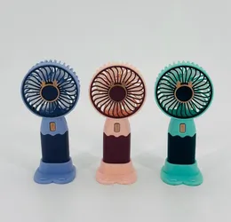 portable mini handheld fans with built-in phone holders