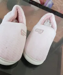 Pair of plush slippers