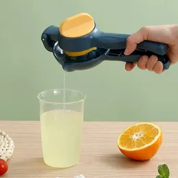 Plastic manual citrus squeezer