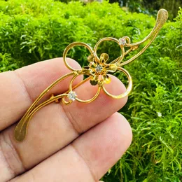 Gold Plated Stylish Dark Multi-Color Flower Theme Kandiyan Saree Brooch / Saree Pin for Women