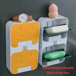 wall-mounted double grid soap holder with a clamshell lid