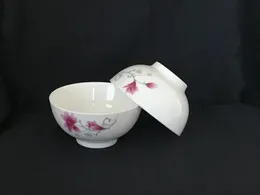 white ceramic bowls feature a delicate floral design
