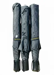 Diamond" brand two-fold umbrellas in various colors.