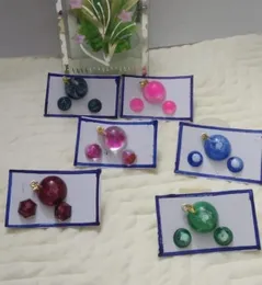 Round pendant and earrings