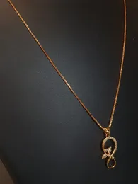 Elegant Gold Plated Infinity Pendant Necklace with Crystal Accents