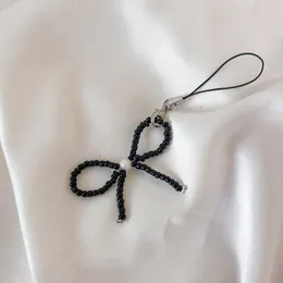 Small Black bow Phone cover keychain 