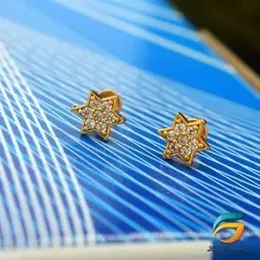 Gold Plated Small Star Earrings With White Stone for Women.