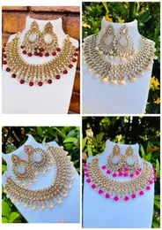 Dull Gold Rich Bridal Necklace Set with Earrings, Thali & Multi-Color Stones with Pearls for Women & Brides