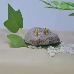 Gold Plated  Darmachakara Stud Flower Stone  Earring.