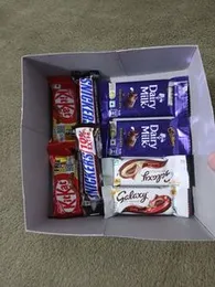 Chocolate Lovers Gift Box including classic favorites like Dairy Milk, Snickers, KitKat, and Galaxy Ã 8 Pieces Sweet Surprise Chocolate Hamper