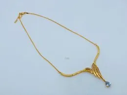 Womenâs Gold-Tone Scallop Necklace Featuring Shimmering Crystals