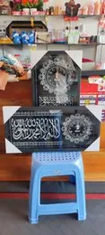 mirrored Islamic calligraphy wall clocks