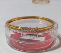 Gold Plated Storn Lock Bangle â Elegant Easy-Lock Designer Bangle for Women