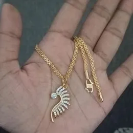 Gold Plated Half Peacock Theme White Stone Pendant with chain