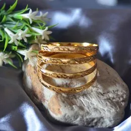 gold plated kids bangels.