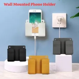 Wall mounted phone holder