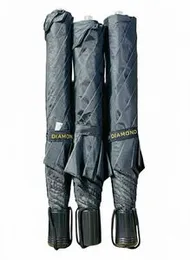 Diamond" brand two-fold umbrellas in various colors.
