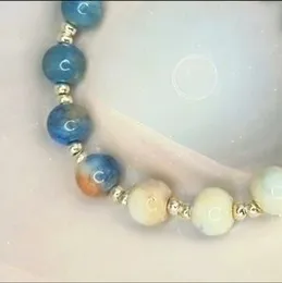 Ocean Dream Beaded Bracelet: Blue Teal Crackle Beads, Bronze Charm