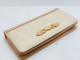 Beige & Blue Womenâs Wallet with Decorative Clasp â Stylish & Functional