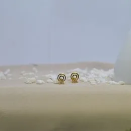 Gold Plated Stylish Round Triangle Stone  Stud Earrings For Women.