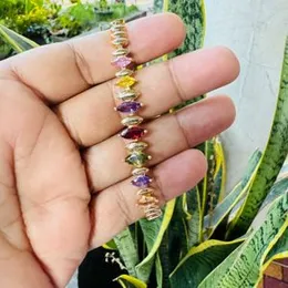 RIZILIA Eternity Tennis Bracelet V-Cut CZ Multi Color Gold Plated Bracelet for Women
