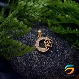Gold Plated Round Pendant With Leaf For Ladies Fashion Stylish Rich Look Pendant For Women.