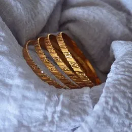gold plated bangles.