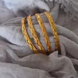 gold plated waves line bangles.