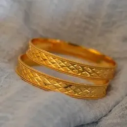 gold plated cross BANGLE.