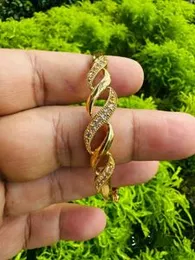 Gold Wave & Line Design Lock Bangle with Fixed White Stone for Women & Girls