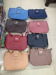 Fancy Ladies Office Handbag with Bow Badge Design â Multicolour