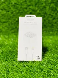 an Apple 20W USB-C Power Adapter.