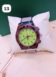 Titanium Green watch with a green sunray dial and a white or grey strap.