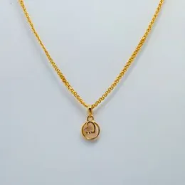 Gold Plated 2mm Bismarck Chain With Round and Heart Pendant With White Stone For Women.