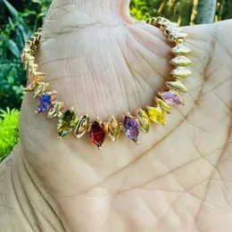 Gold plated baslet RIZILIA Eternity Tennis Bracelet & V Cut CZ in Yellow Gold Plated, multi color Bracelet for women