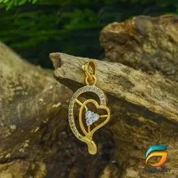 Carat in Karats 10K Yellow Gold CZ Heart Pendant Charm With 14K Yellow Gold Lightweight  Pendant For Women.