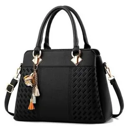 Elegant PU Leather Handbag with Shoulder Strap and Tassel Charm