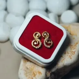 gold plated fashion style womens earrings.