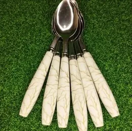 Cremic finish style stainless steel premium table spoon set 6 pieces.