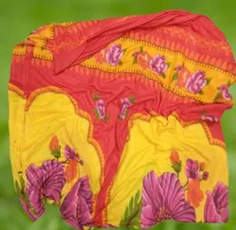 6Ã5 Super soft luxurious bed mink blanket with a random floral print in red and yellow.