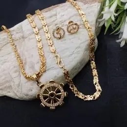 gold plated stylish rich look 4mm Singapore chain with dharma chakra stone pendant for stylish women's.