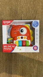 Kids Toys â HUANGER Musical Piano (4 Buttons, Dinosaur Shape)