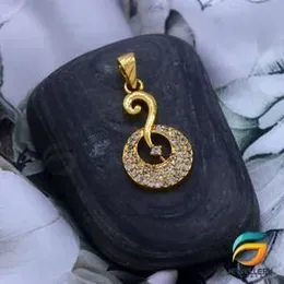 Gold Plated Rich Look Stylish Round Theme Pendant With Stone For Ladies.