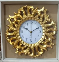 Gold ornate decorative wall clock