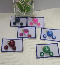 Round pendant and earrings