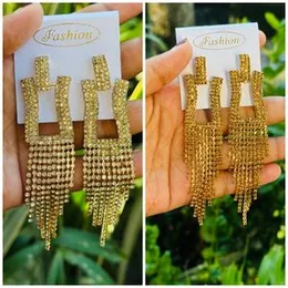 Golden Prism Tassel Earrings With White Stone