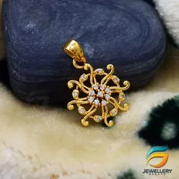 Gold Plated Beautiful Flower Sun Pendant With Stone Fashion and Stylish Design For Ladies.